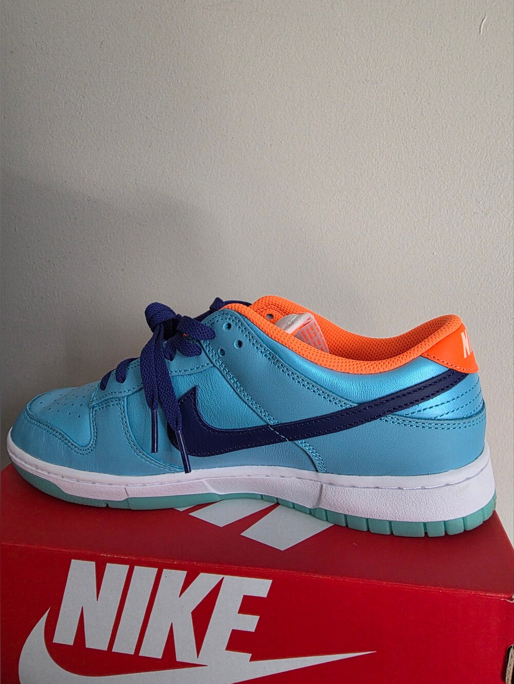 Nike Low Top Athletic Shoes - Light Blue with Orange Lining and Navy Swoosh